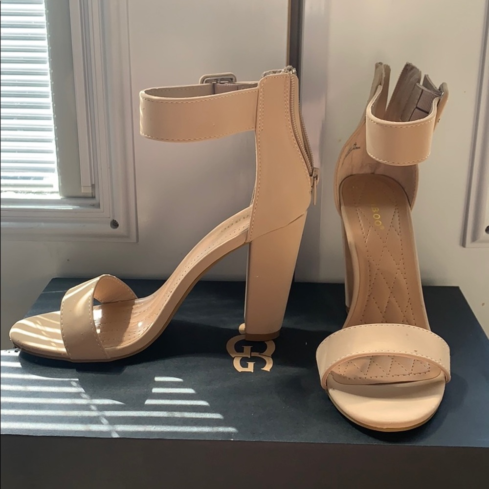 Tan open toed heels with ankle straps